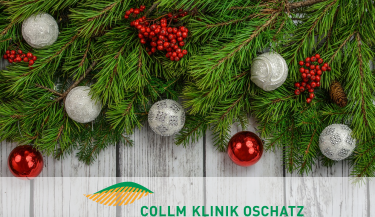 Das Logo der Klinik ist mit geschmückten Tannenzweigen verziert.